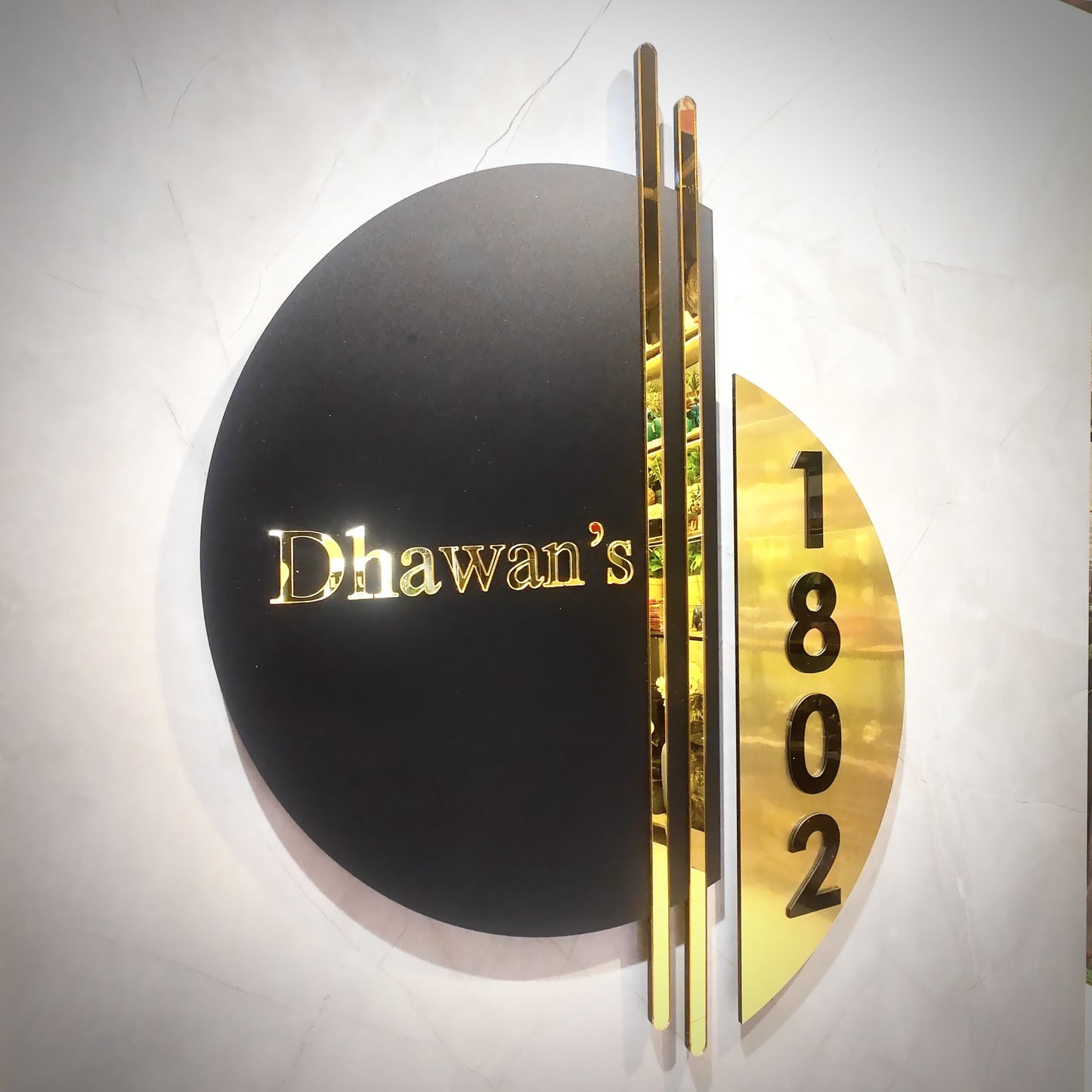 The Bisected Cir'Cle Luxury Nameplate