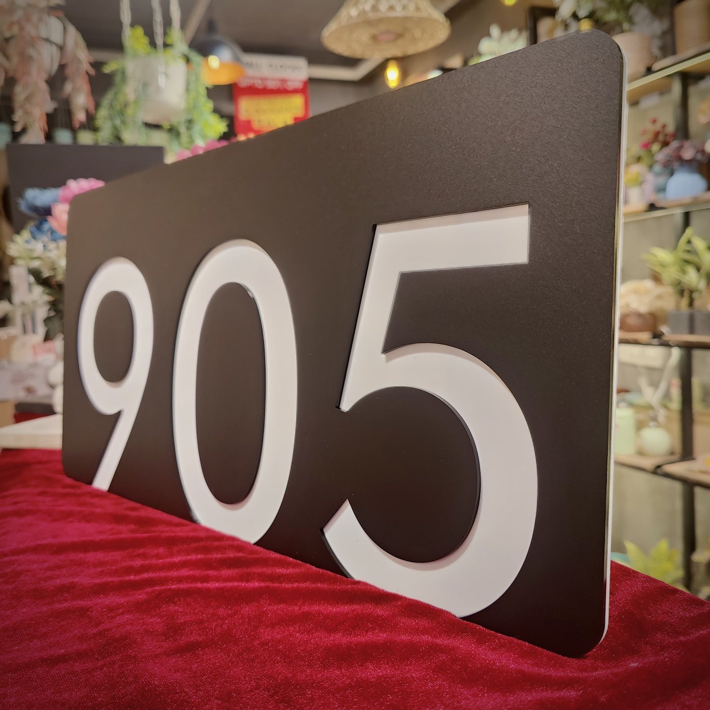 Number Behind the Black Nameplate