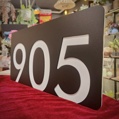 Number Behind the Black Nameplate