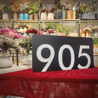 Number Behind the Black Nameplate