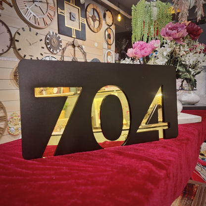 Number Behind the Black Nameplate