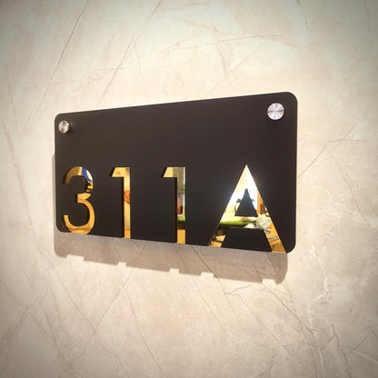 Number Behind the Black Nameplate