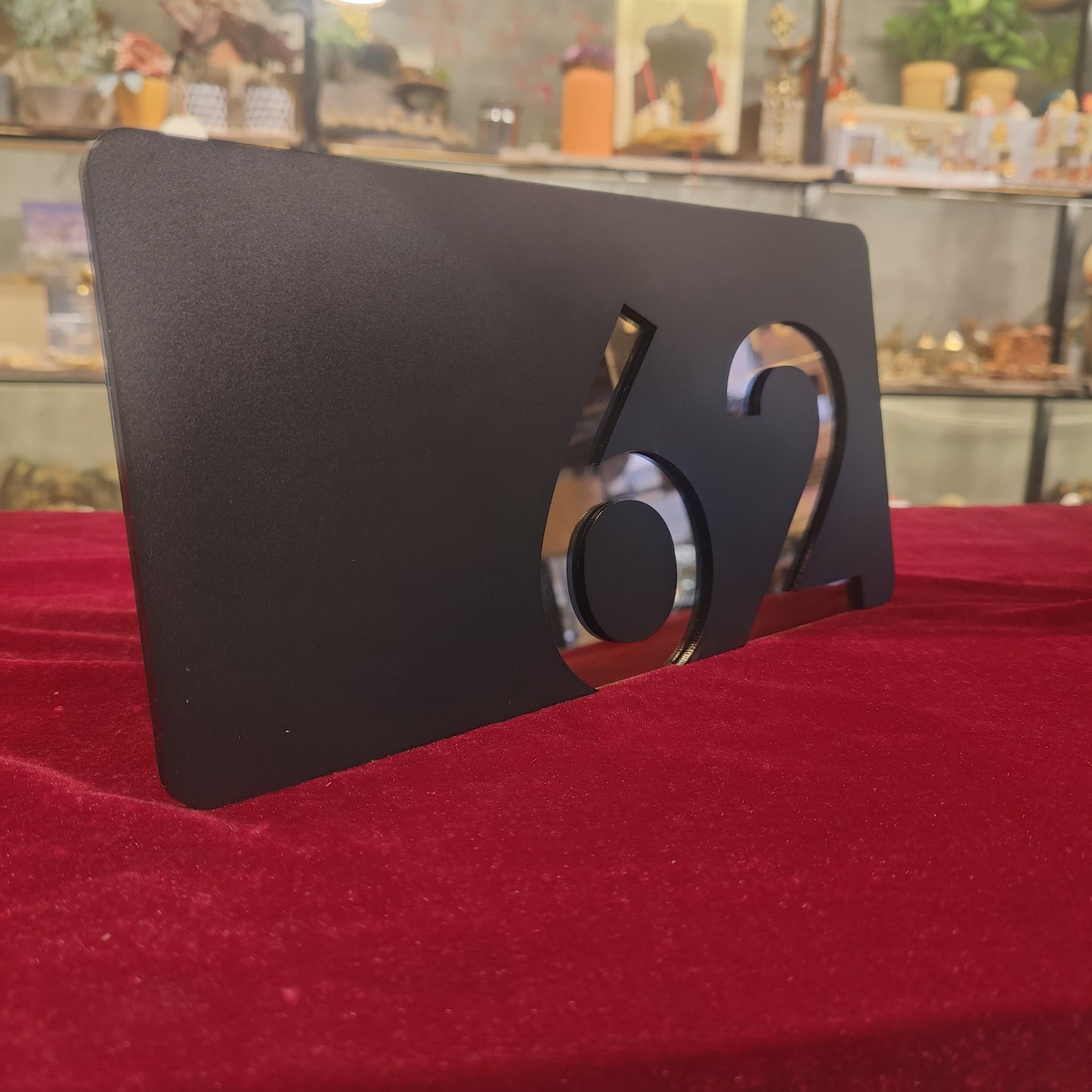 Number Behind the Black Nameplate