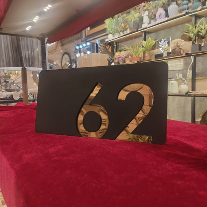 Number Behind the Black Nameplate