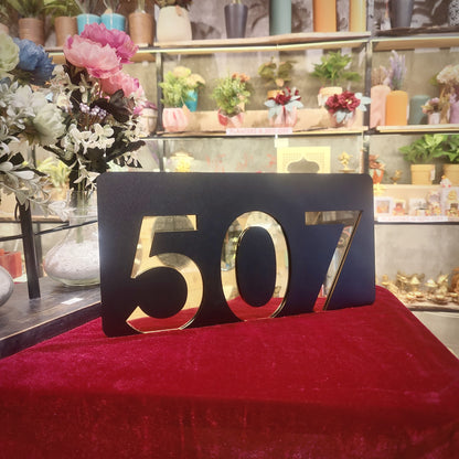 Number Behind the Black Nameplate