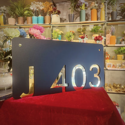 Number Behind the Black Nameplate