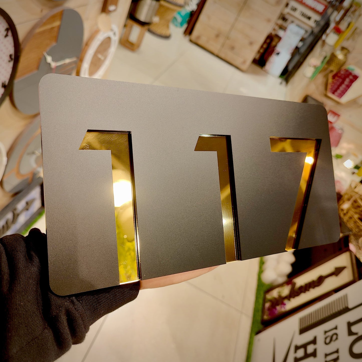 Number Behind the Black Nameplate