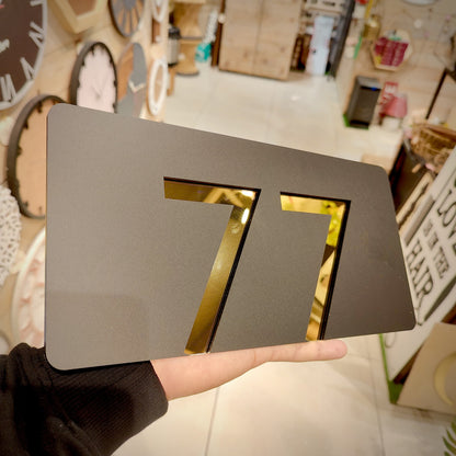 Number Behind the Black Nameplate