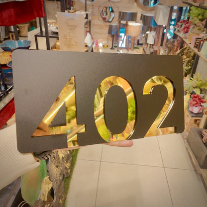 Number Behind the Black Nameplate