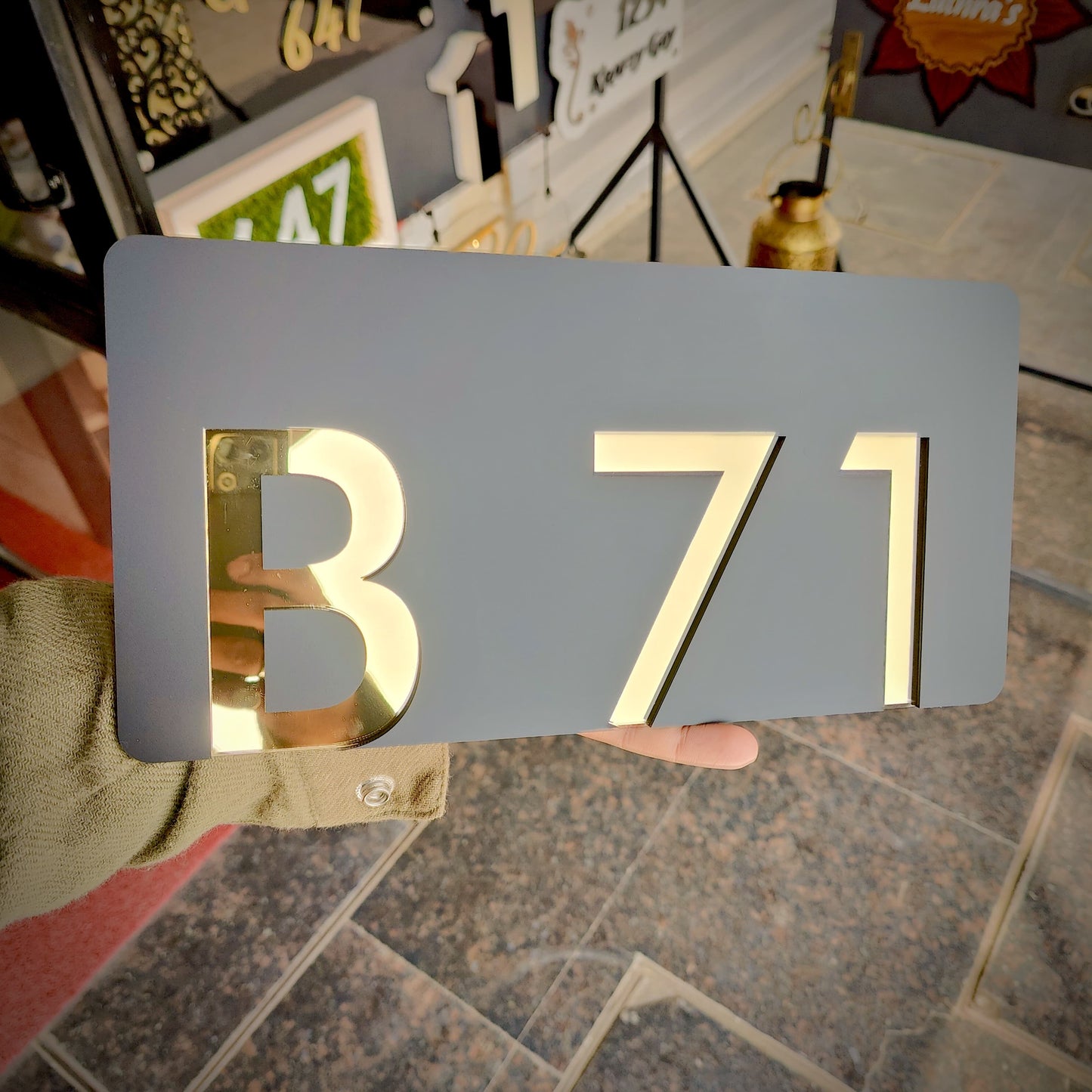 Number Behind the Black Nameplate