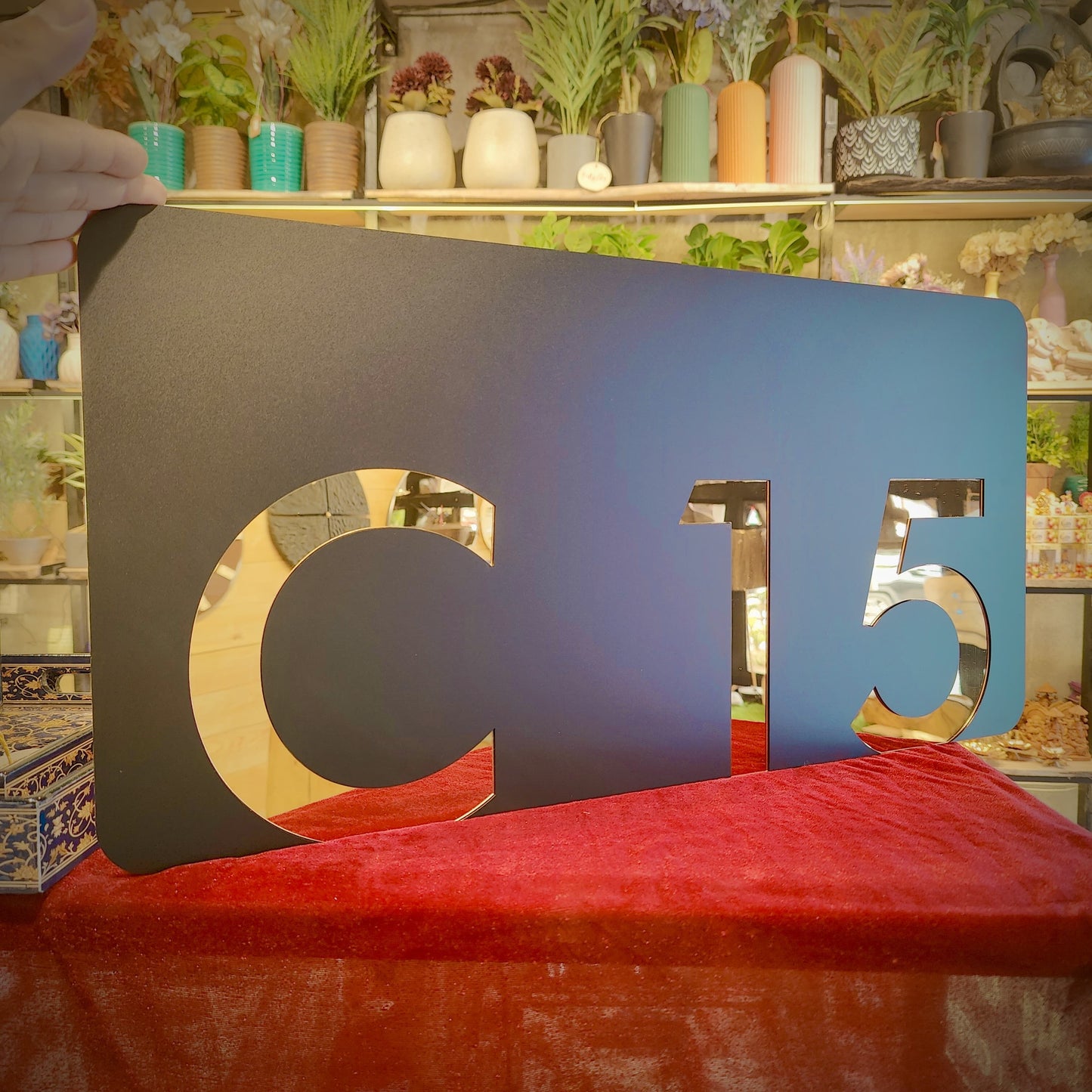 Number Behind the Black Nameplate