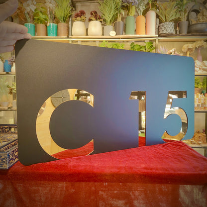 Number Behind the Black Nameplate